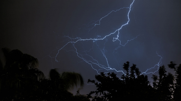 A large lightning bolt at night